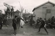 Children playing soccer in the street, Glasgow, Scotland