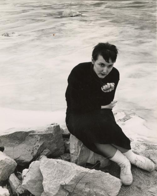 Portrait of woman with beads on rocks, Indiana