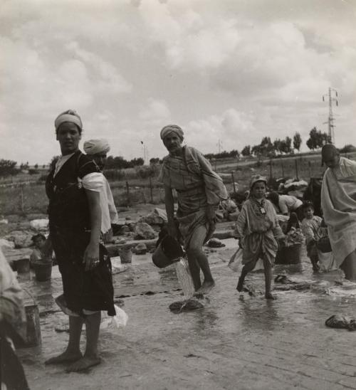 Washers near the supplying stream of Bidonville (shantytown), near Casablanca, Morocco