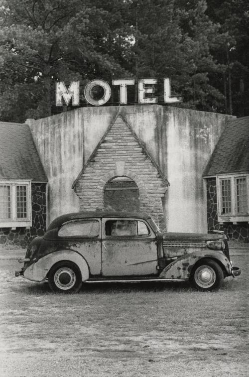 Motel with vintage car out front, USA