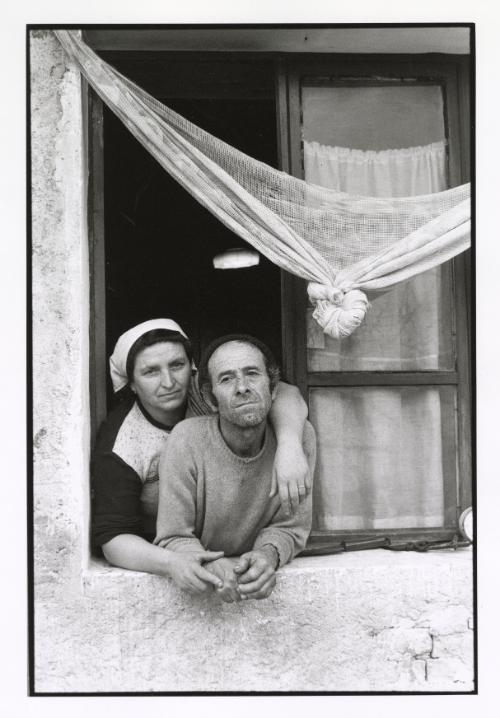 Piedmont, Italy (Couple in window)