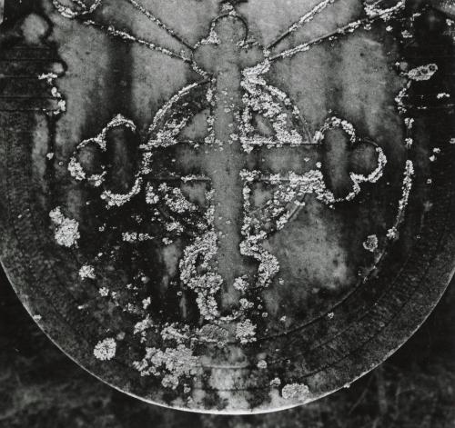 Abstract cross on gravestone