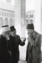 Three men wearing fez hats, Syria