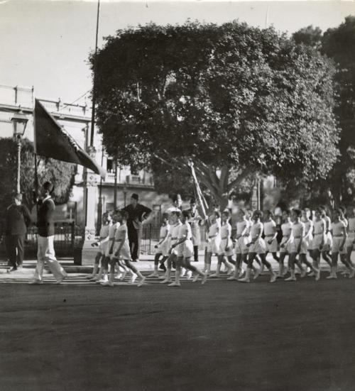 King Farouk's Wedding. Young Athletes parade before the king, Cairo, Egypt