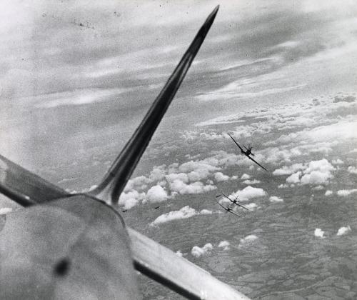 German gunner's eye view of three Spitfires of No. 610 Squadron, 'attacking' a Blenheim