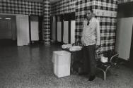 Men's Room Attendant, Hialeah Park, Hialeah, FL, from the series "Racing Days"