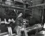 Man singing in industrial plant, Tri-Valley Area, Northern California, from the series "Working"