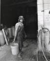 Worker with bucket, Tri-Valley Area, Northern California, from the series "Working"
