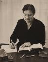 Woman writing prose