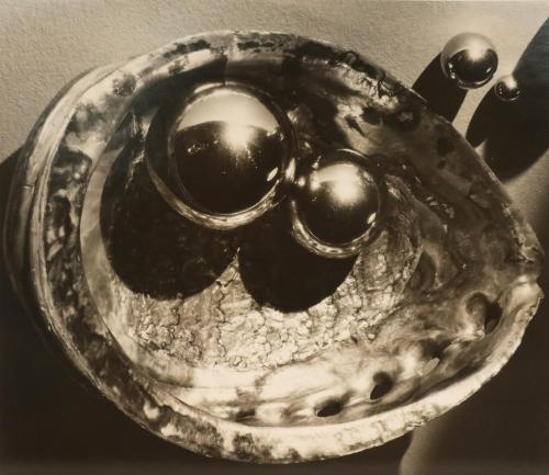 Still-life with metal balls in shell