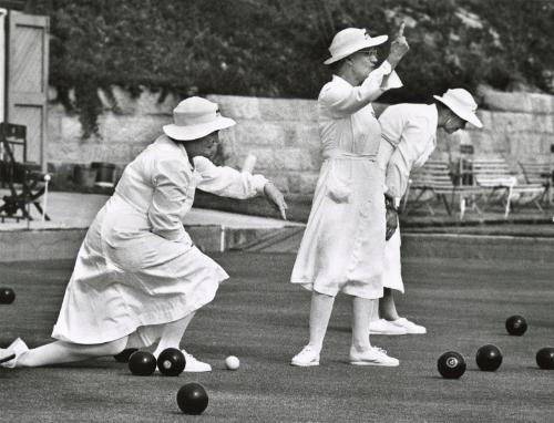 "Near Melbourne, Australia, a women’s bowling club is holding their Saturday morning tournament. We know the game as Bacci. The object is to get the black balls close to the one white ball."