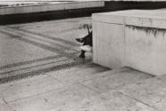 Rossio with man with umbrella, Lisbon, Portugal