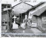 Weird Shantytown in old cemetery was home for 5,000 Saigon war refugees. Like others of the city's slums, the community presented a health hazard, Vietnam