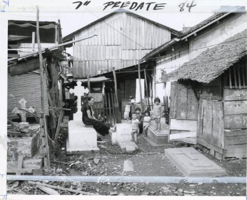 Weird Shantytown in old cemetery was home for 5,000 Saigon war refugees. Like others of the city's slums, the community presented a health hazard, Vietnam