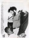 Yippie leader Jerry Rubin rips off his jurists robe in front of a University of Utah crowd in Salt Lake City, Utah as part of his defiance of the nation's legal system.