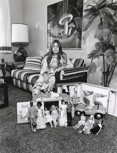 This is Valerie’s world in miniature. She makes it what she wants it to be … without war, racial hate or misunderstanding. Ken and Barbie (dolls) are man and woman rather than Mom and Dad. They enjoy living and having a camper truck is the good life. Today Valerie has the chicken pox and can’t go out and play.