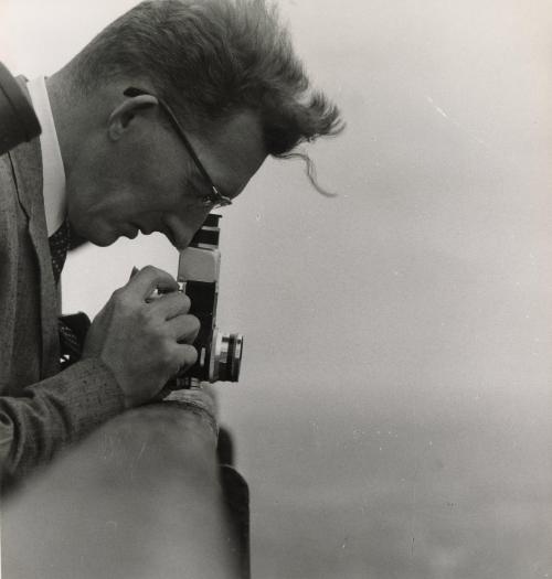 Man with camera, likely Germany, c. 1965