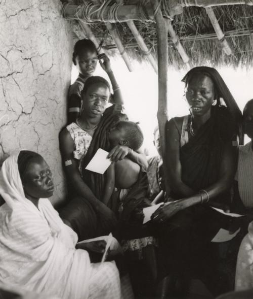 Patients wait to see the UNICEF doctor in a small village, Nigeria, Africa, 1967-70