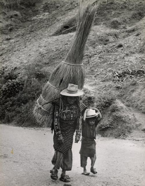 Mother with son carrying goods to the market of Chichicastenango, Guatemala, 1961