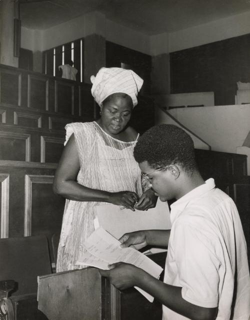 A mother and student in conference with her university professor, Ivory Coast or Nigeria, c. 1960