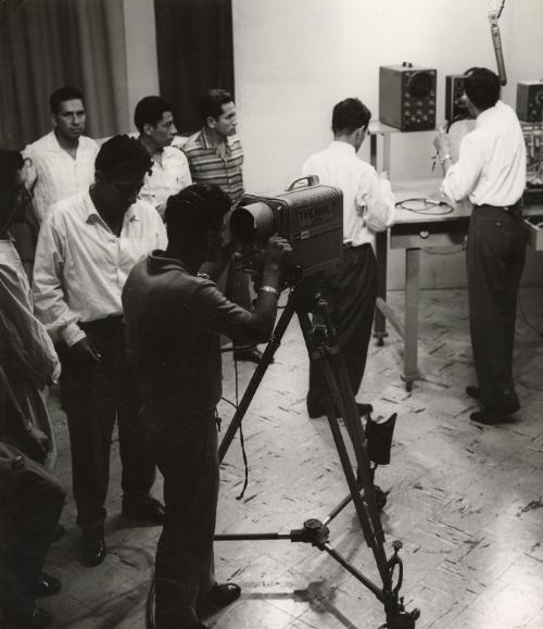 Ici Lima --The first specialized TV school opened in the Peruvian capital: there are schools for everything in the world and as human knowledge expands, new schools open their doors. Each step of progress generates another, education is the driving force of modern civilization. Television, one of the most attractive inventions of the century, is still in its infancy. The future holds extraordinary possibilities for it, and in all countries we are trying to speed up the training of specialists. Peru deserves the credit for having created the first TV school. The program covers everything related to television, from the construction of a receiver to the production of a program. The courses last two years and the number of students is currently limited to 30. The school director is a TV technician, Isaac Aquise Chavez who is assisted by...