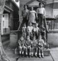 Puerto Rican Couple -- 9 Children on Steps (Genevera & Husband), Buffalo, NY, 1973 / 1985 / 1992 / 2002