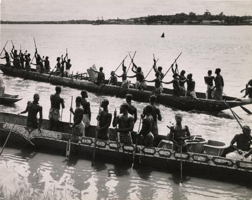 A Congolese canoe that can carry 30-40 fishermen through the rapids of the river, the Belgian Congo (now Democratic Republic of the Congo), 1959