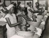 Mothers bathing their babies at a baby care course at the Red Cross, Leopoldville, the Belgian Congo (now Kinshasa, Democratic Republic of the Congo), 1957