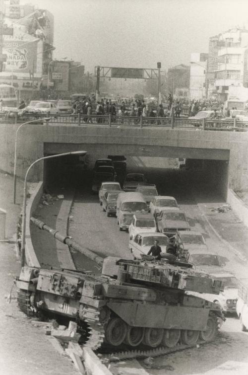 After the deadly events of the last weekend in the Iranian capital, rebel groups continue their revolutionary actions --The attack on the American Embassy --Civilians are taken away --The Marines surrender --At the University, the guerrillas give courses in weapon handling --state of shah sacked. Presentation of ministers of the bazargan cabinet, Tehran, February 14, 1979