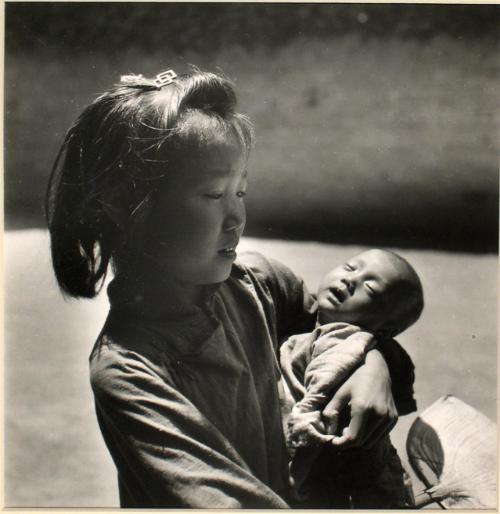 Ten-year-old with three-months-old sister from the "Chinese Album"